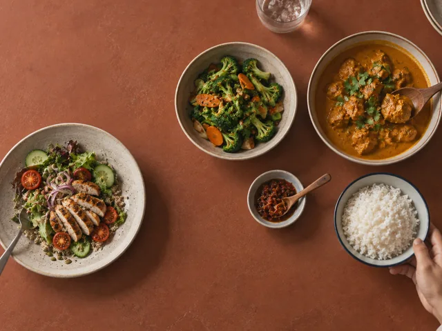 Several different dishes arranged for a shared meal, representing the different product traits that can make food easy to notice and share.